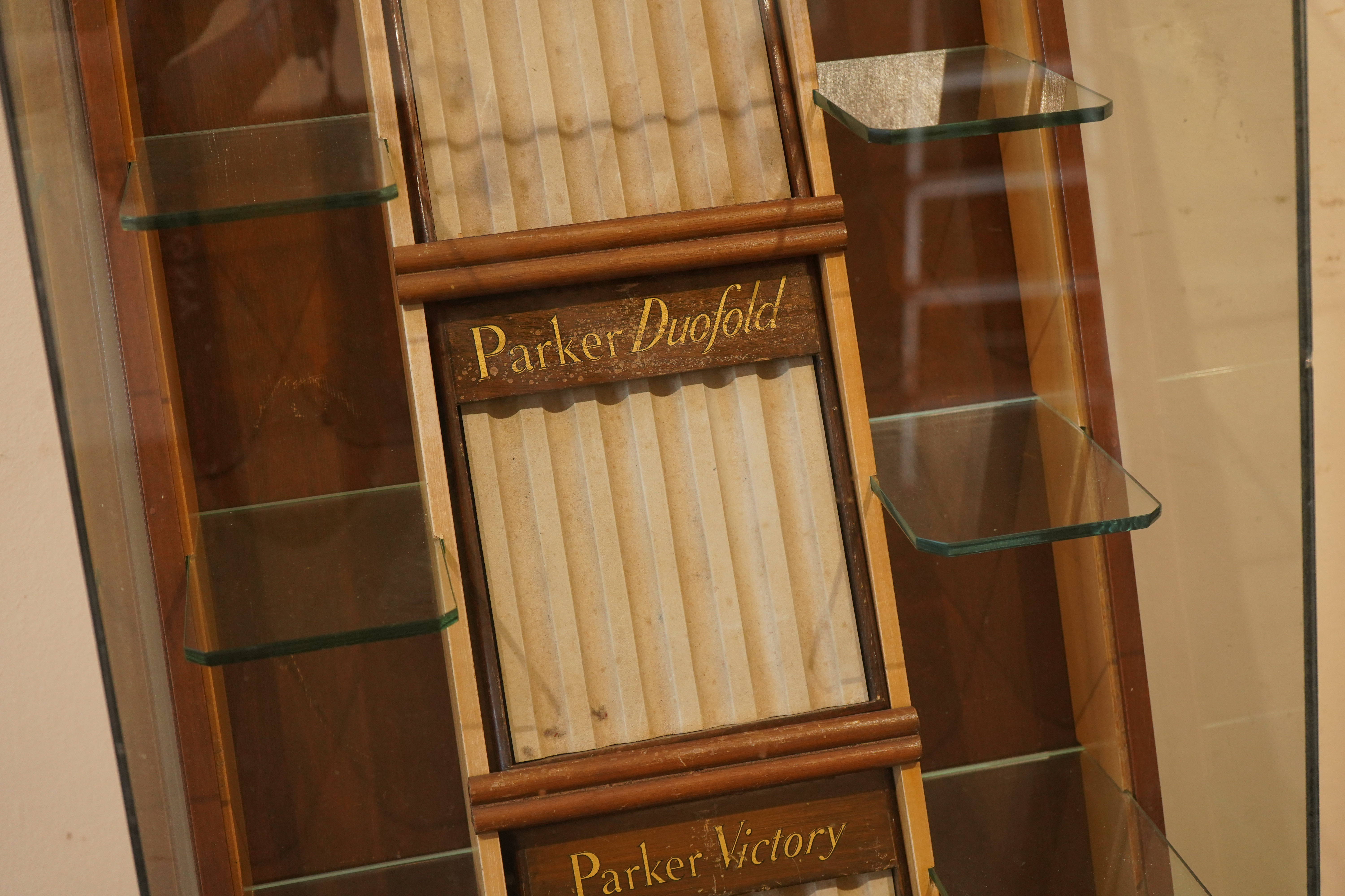 A very rare Parker Shop display cabinet, floor mounted c.1940's, with three trays and glass shelves for Parker '51's', 'Dufolds' and 'Victory's'